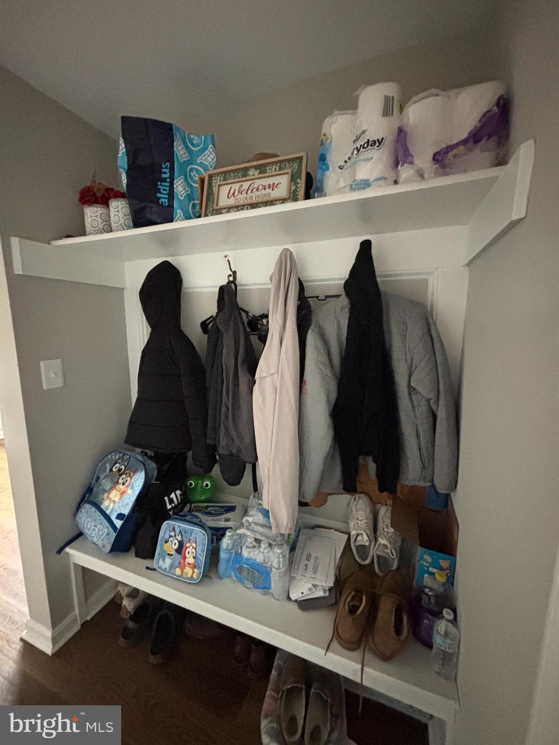 101 Anchor Lane Lusby, MD 20657 - Photo 23 of 45 a view of walk in closet with clothes and shoes