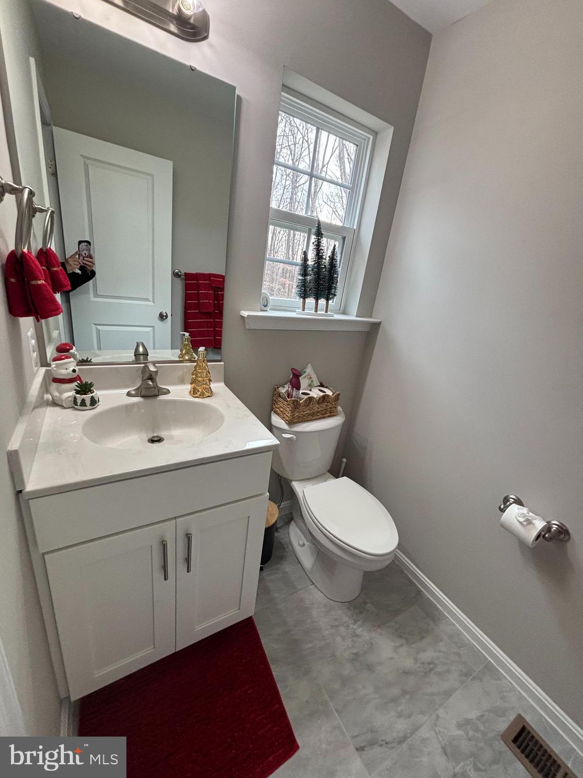 101 Anchor Lane Lusby, MD 20657 - Photo 24 of 45 a bathroom with a sink toilet and window