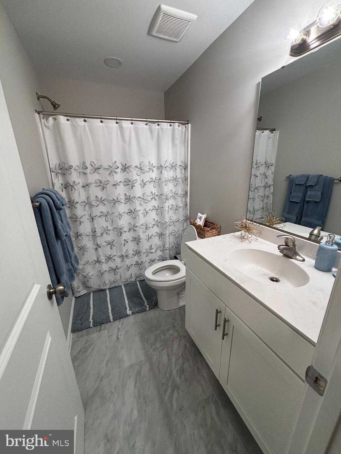 101 Anchor Lane Lusby, MD 20657 - Photo 33 of 45 a bathroom with a sink toilet and shower