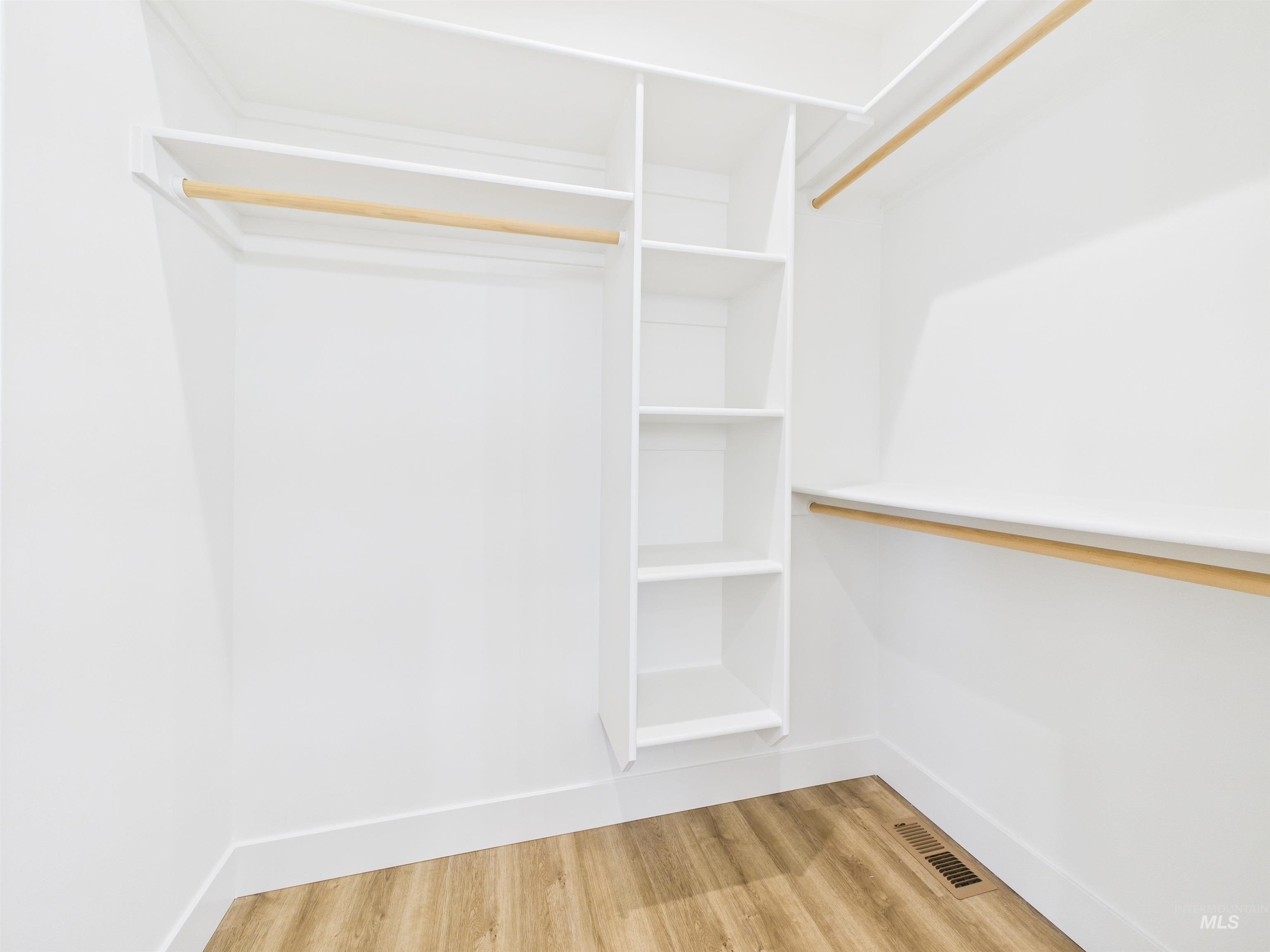 1216 Bronze Drive Rupert, ID 83350 - Photo 18 of 28 Spacious closet with light wood-type flooring