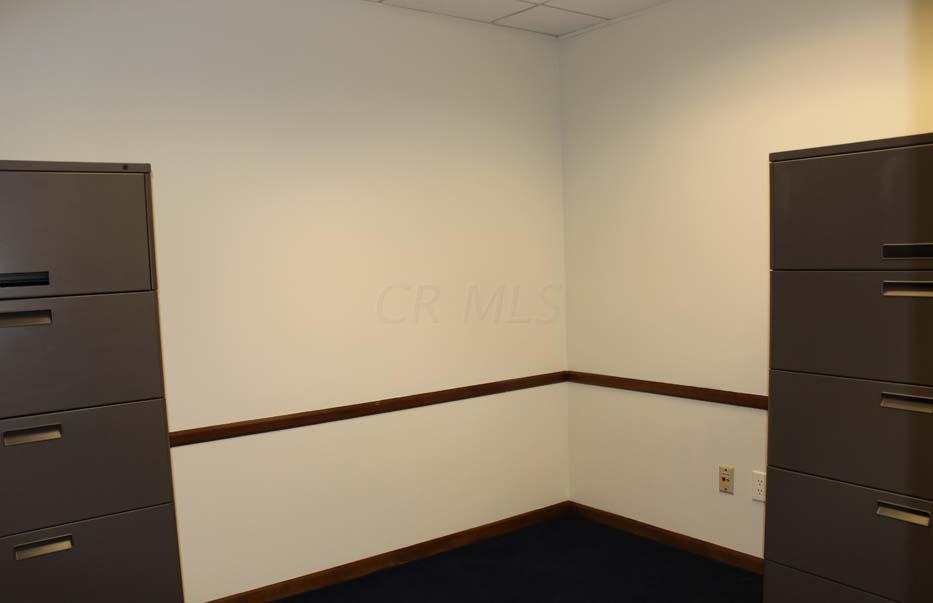1900 Bethel Road Columbus, OH 43235 - Photo 17 of 24 New blue carpet ~02. Ivory painted walls. Suspended ceiling. Fluorescent lighting. Chair railing.