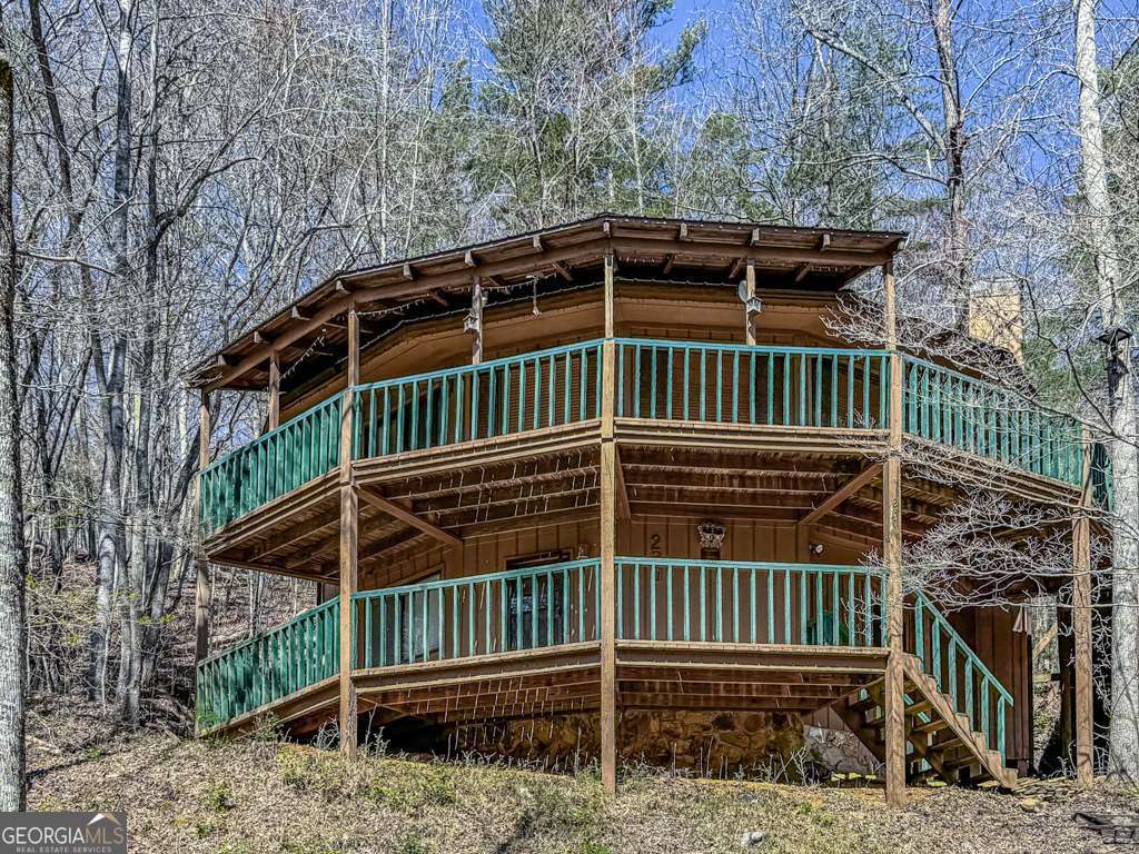a view of balcony with small garden