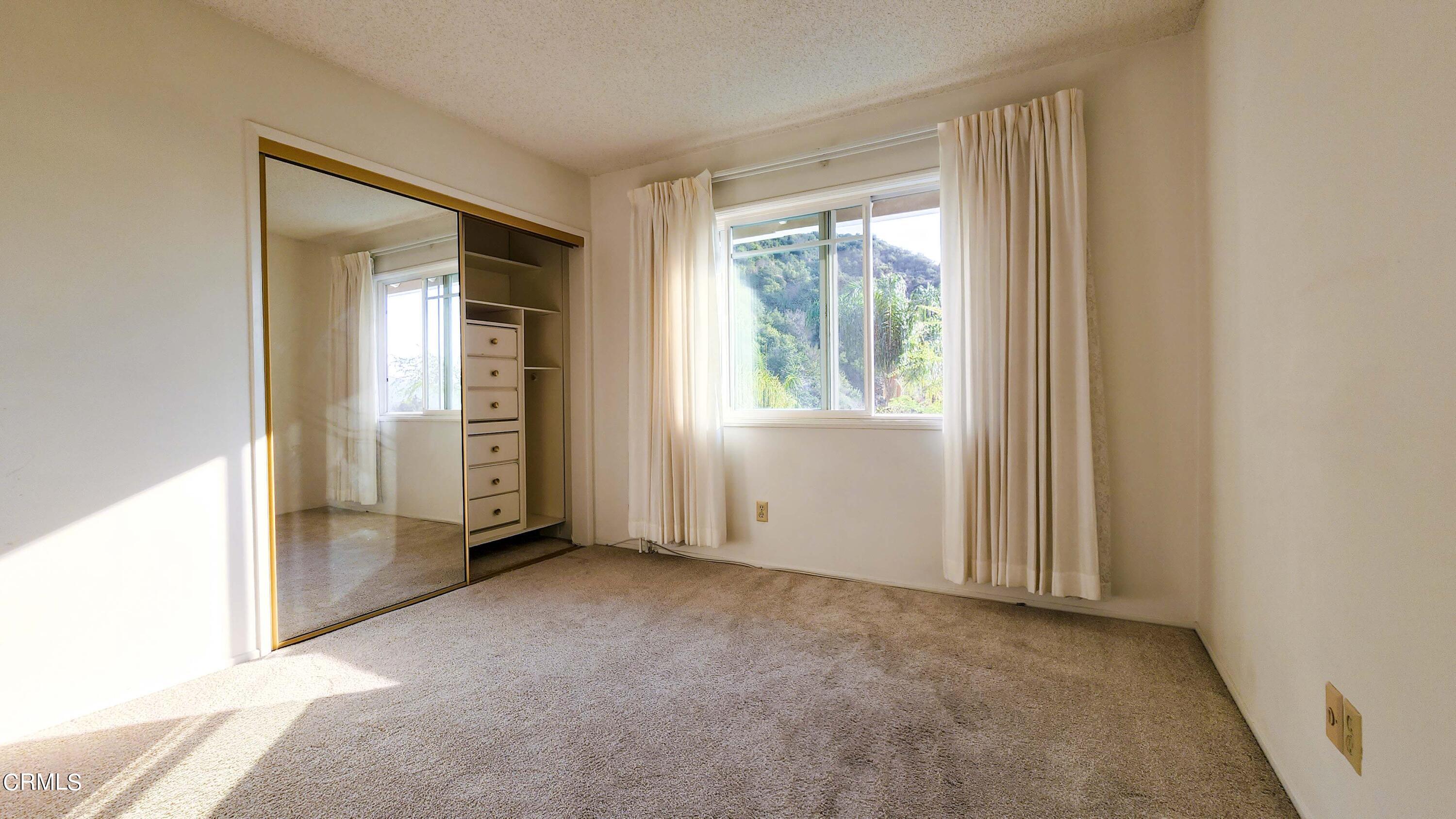1980 Crestshire Drive Glendale, CA 91208 - Photo 20 of 27 a view of an empty room with window