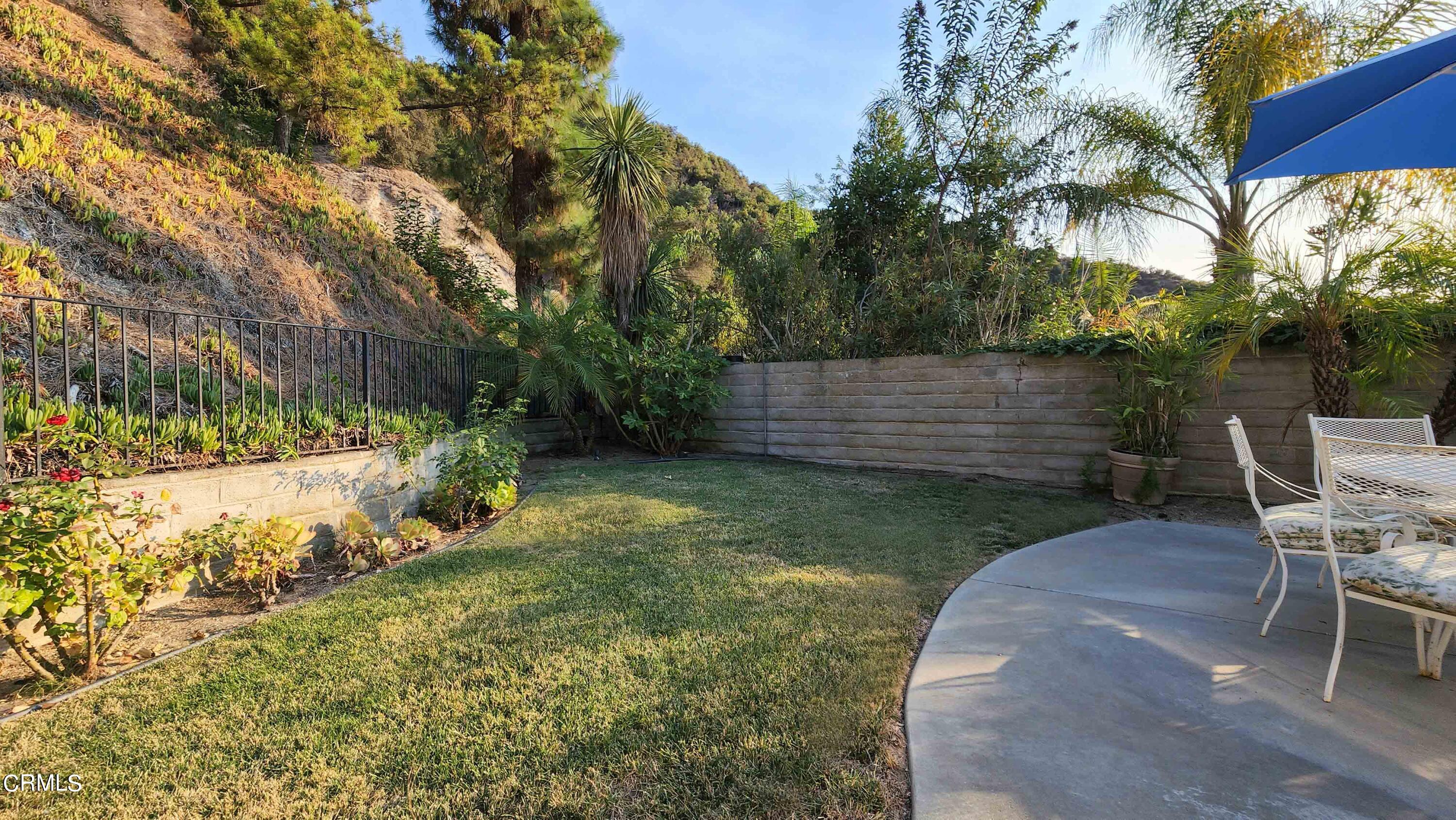 1980 Crestshire Drive Glendale, CA 91208 - Photo 22 of 27 a view of a backyard with a garden