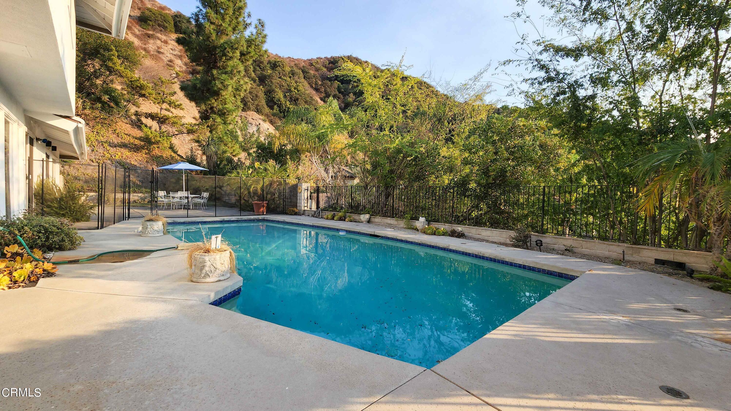 1980 Crestshire Drive Glendale, CA 91208 - Photo 25 of 27 a view of swimming pool with a yard