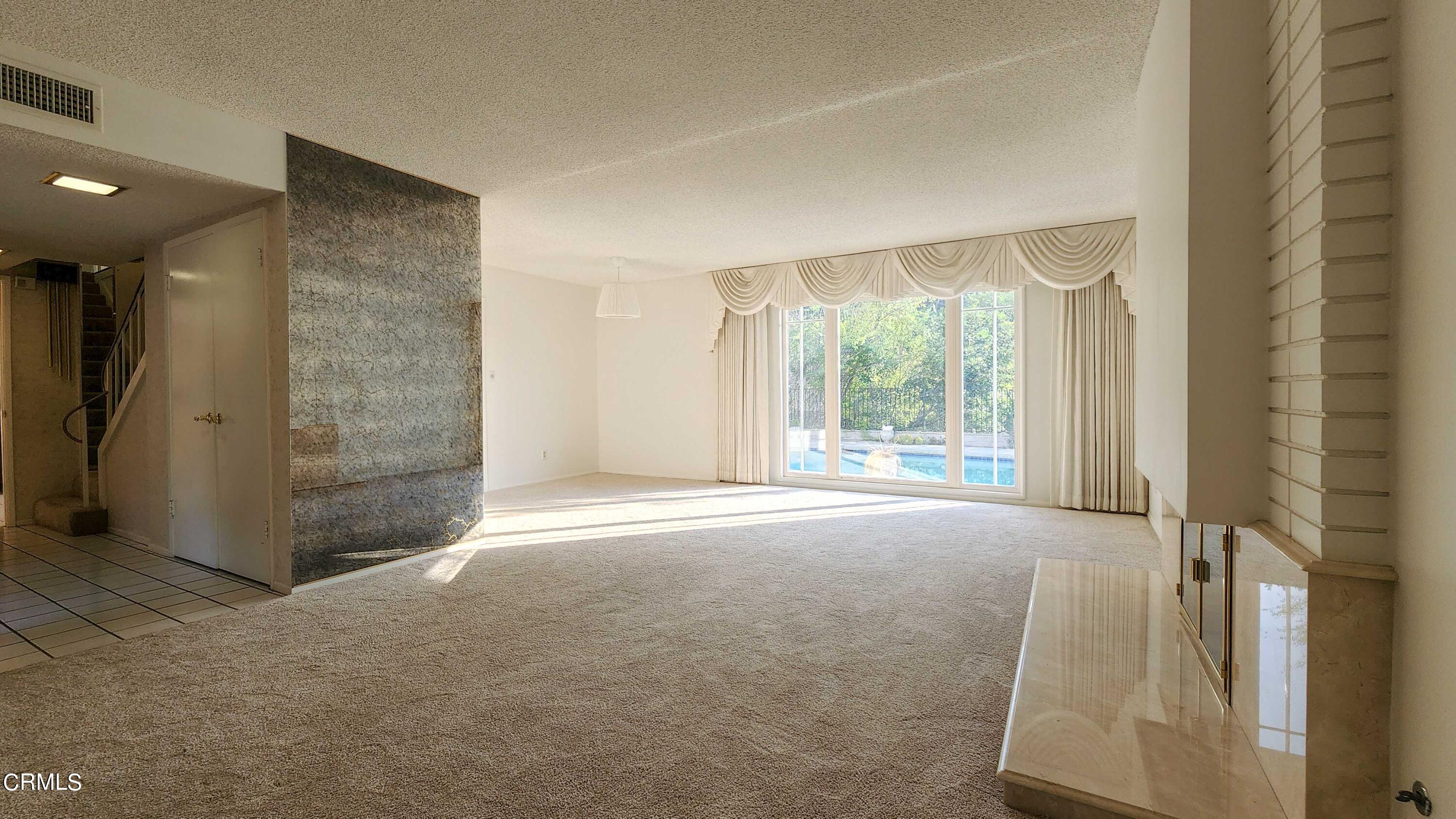 1980 Crestshire Drive Glendale, CA 91208 - Photo 5 of 27 a view of a big room with windows and closet