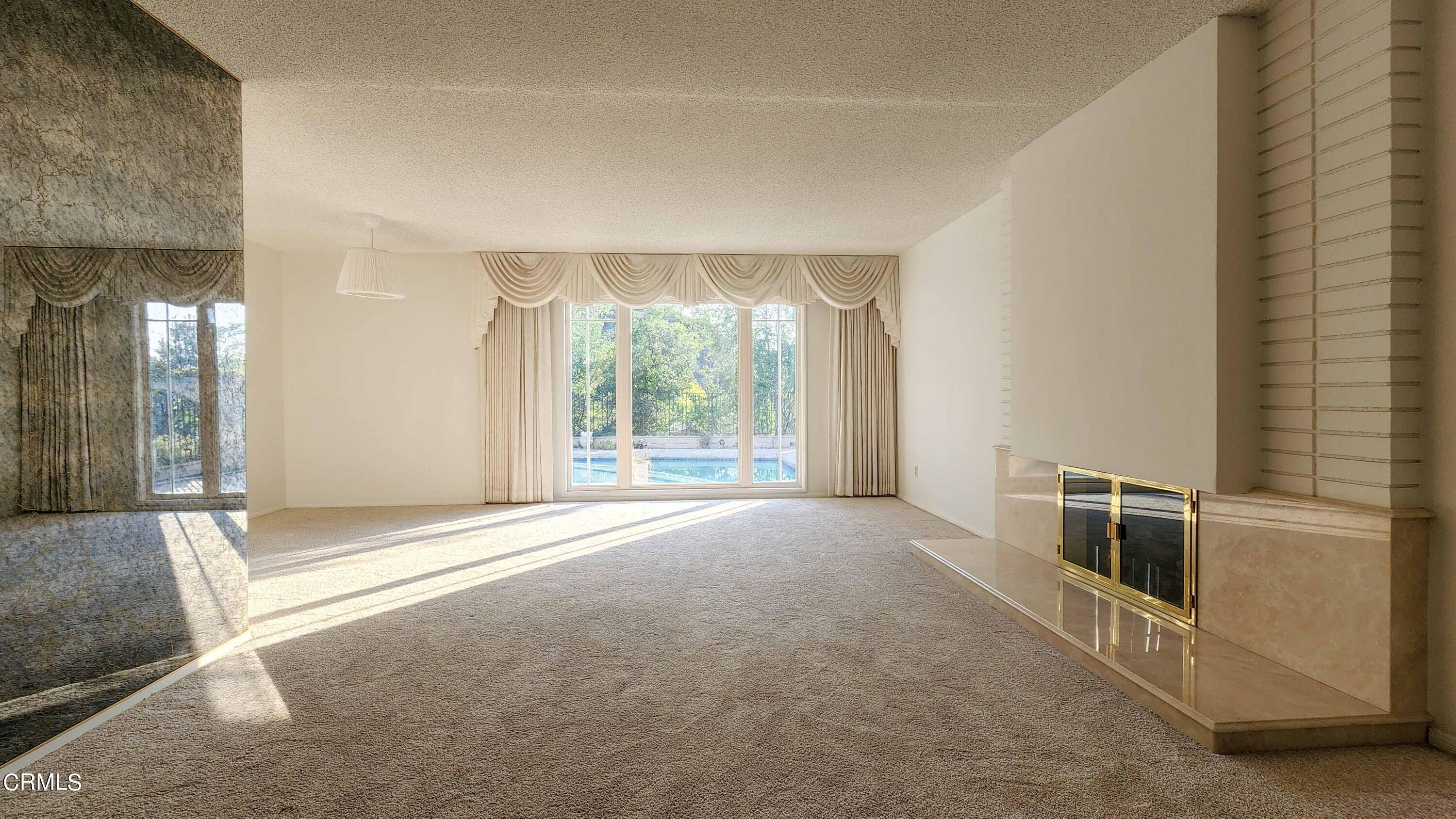 1980 Crestshire Drive Glendale, CA 91208 - Photo 6 of 27 a view of an empty room with a window
