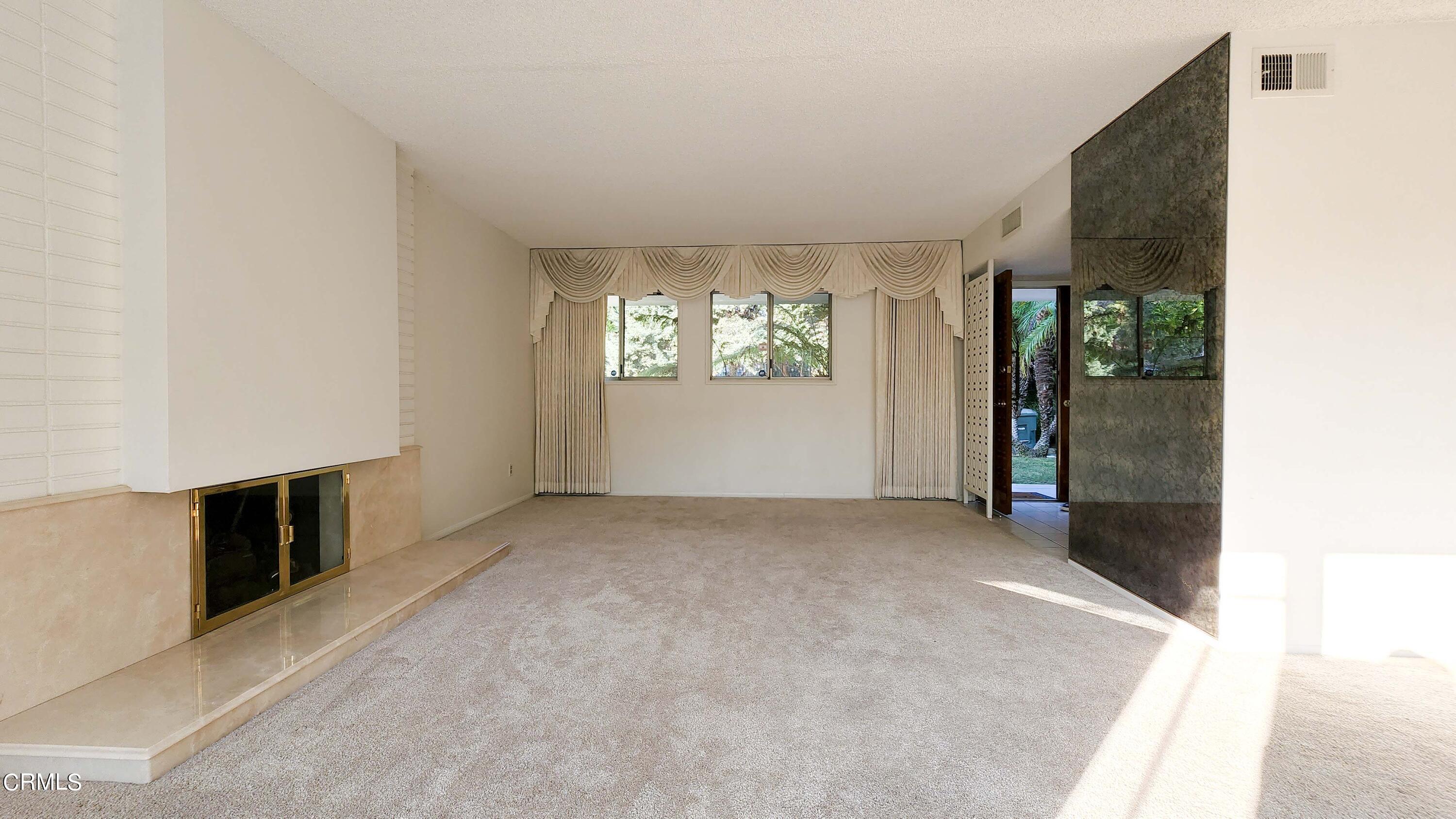 1980 Crestshire Drive Glendale, CA 91208 - Photo 7 of 27 an empty room with windows
