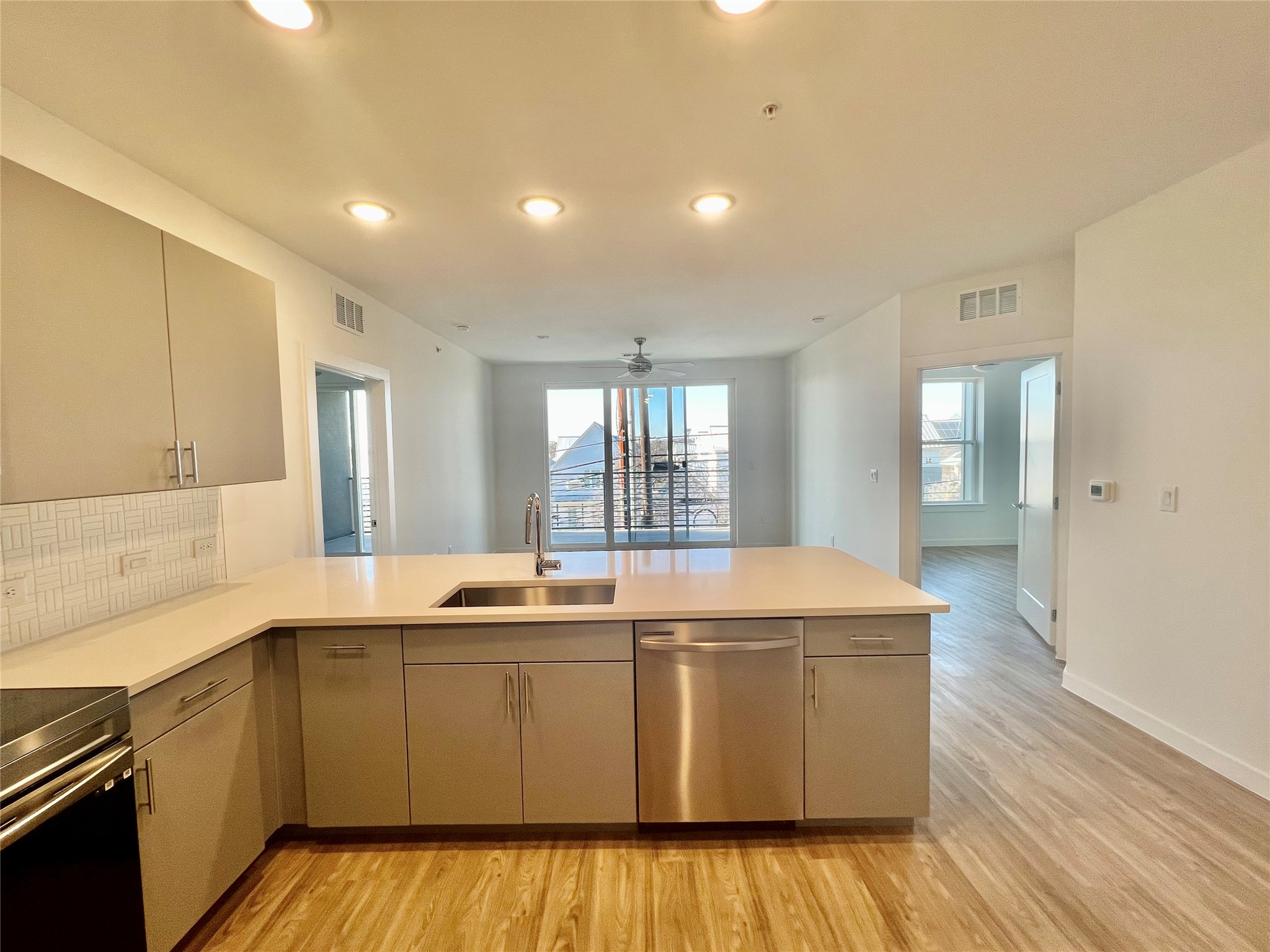 4801 Springdale Road, Unit 2210 Austin, TX 78723 - Photo 5 of 17 The kitchen features stainless steel appliances, a breakfast bar and plenty of storage