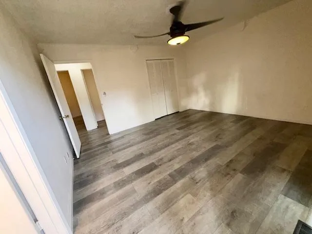 a kitchen with cabinets and window