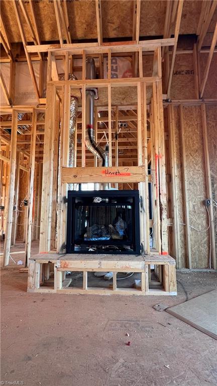 6205 Phillippi Road Julian, NC 27283 - Photo 13 of 33 Floor to ceiling gas logs fireplace/hearth