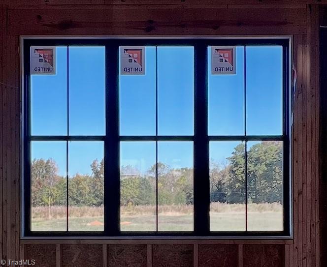 6205 Phillippi Road Julian, NC 27283 - Photo 14 of 33 Oversized windows in Primary bedroom