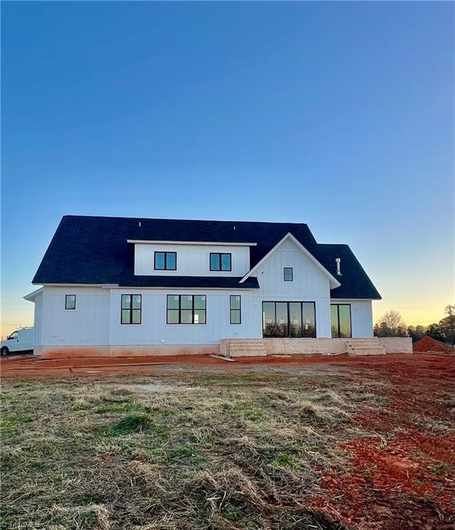 6205 Phillippi Road Julian, NC 27283 - Photo 3 of 35 Oversized back porch patio with folding glass doors