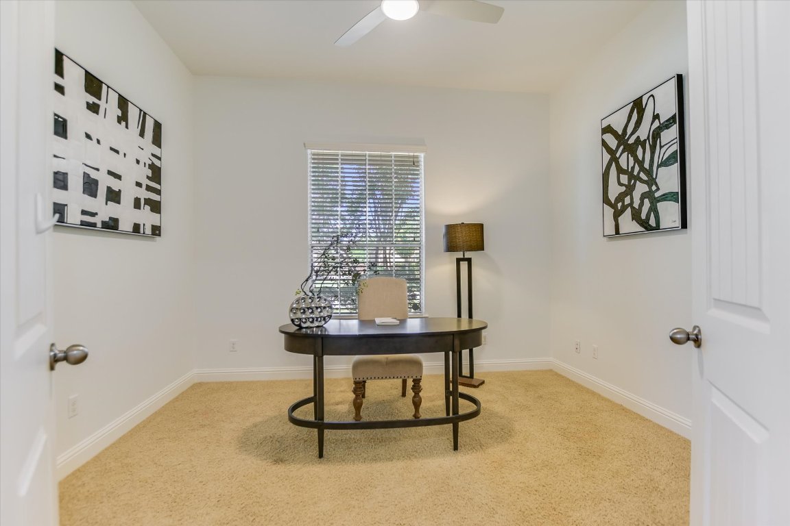 3104 Herradura Drive Cedar Park, TX 78641 - Photo 12 of 20 a view of a room with a table and chairs