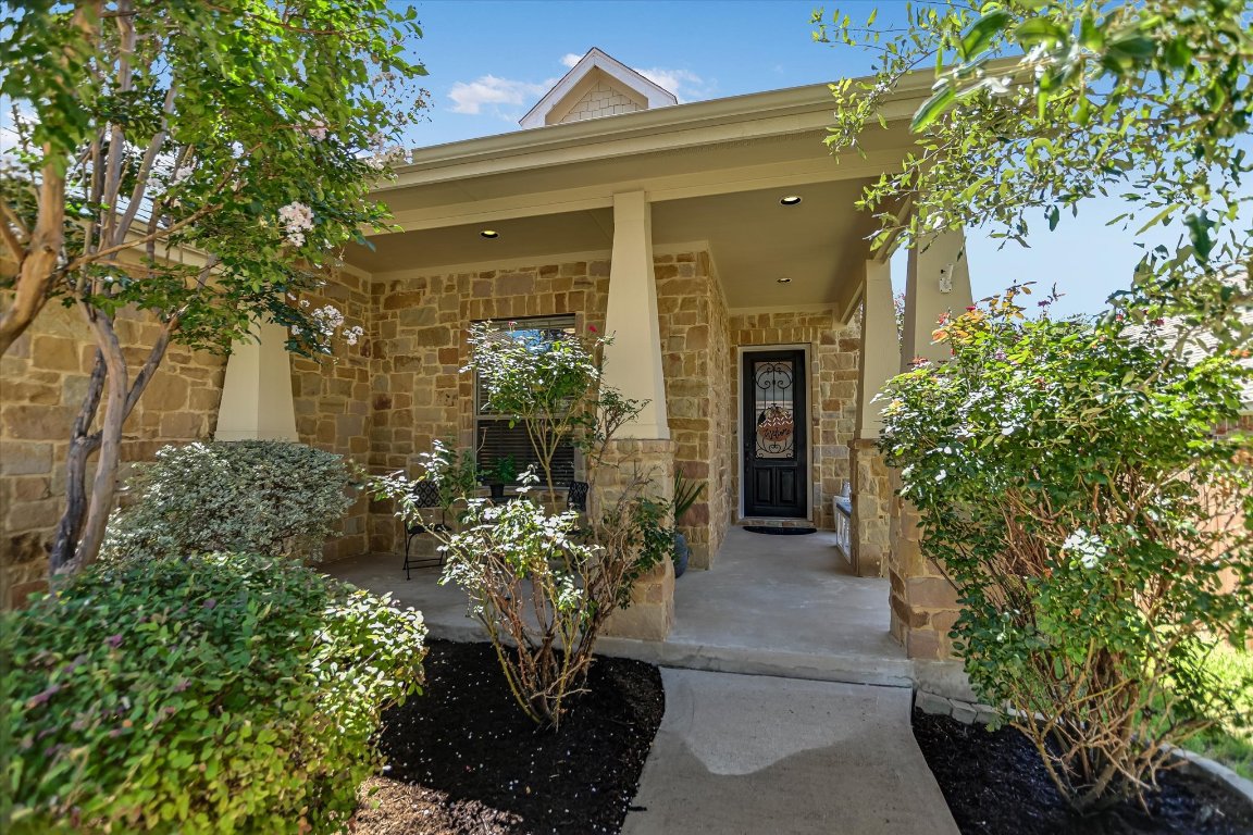3104 Herradura Drive Cedar Park, TX 78641 - Photo 2 of 20 front view of a house with potted plants