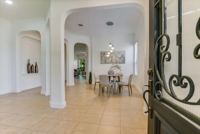 a view of a livingroom with furniture and front door