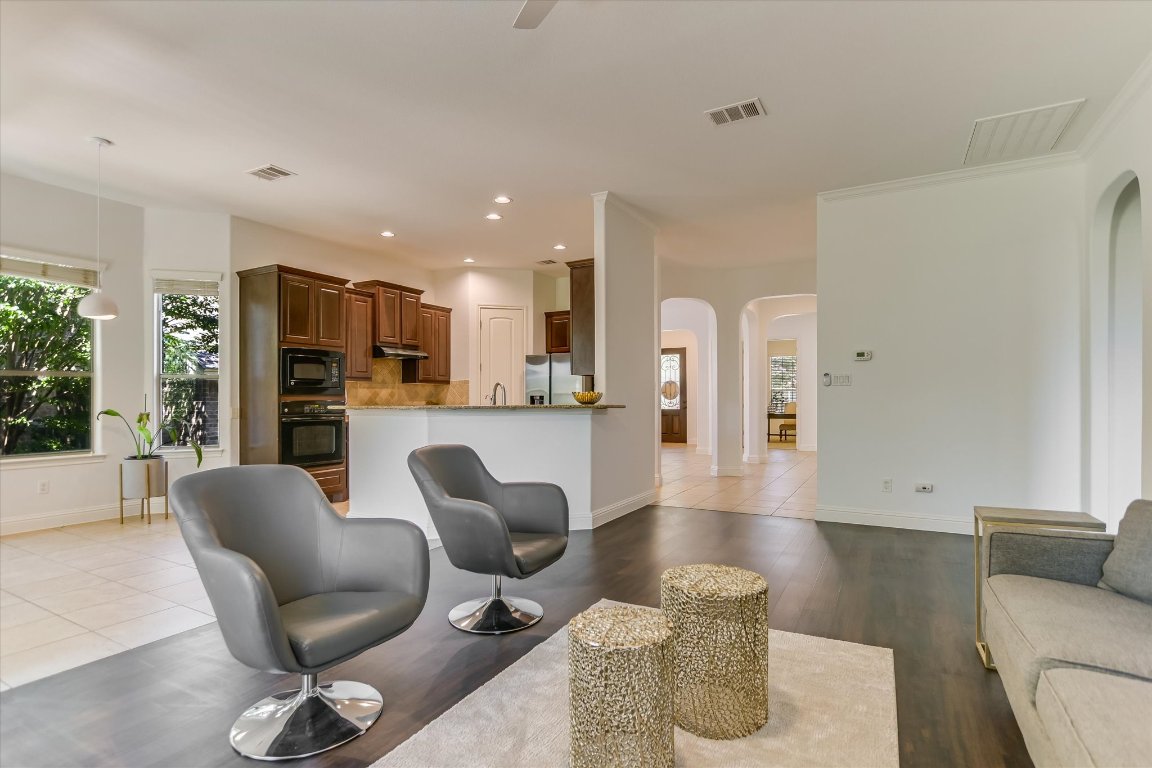 3104 Herradura Drive Cedar Park, TX 78641 - Photo 6 of 20 a living room with furniture and kitchen view