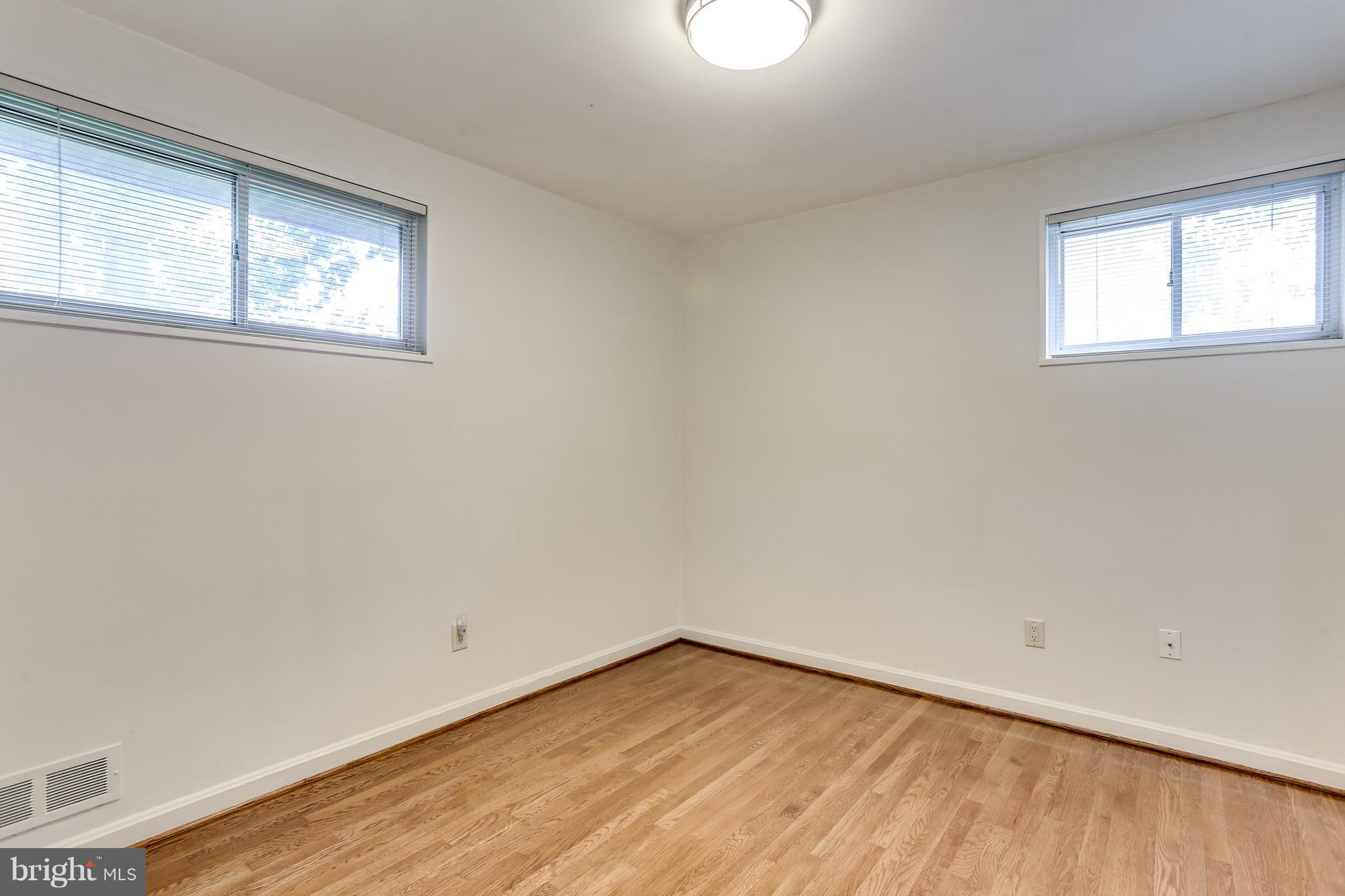 12714 Helen Road Silver Spring, MD 20906 - Photo 11 of 19 an empty room with a window