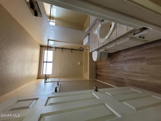 a bathroom with a sink a toilet and a bathtub