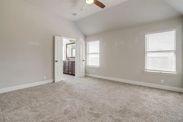a view of an empty walk in closet