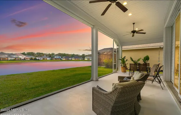 a view of a patio with couches table and chairs