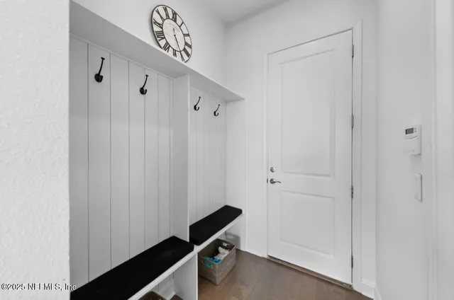 a view of a hallway with closet