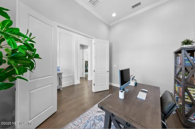 a view of a workspace with furniture