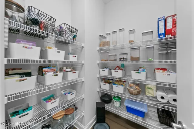 a shelf with books and knick knacks on it