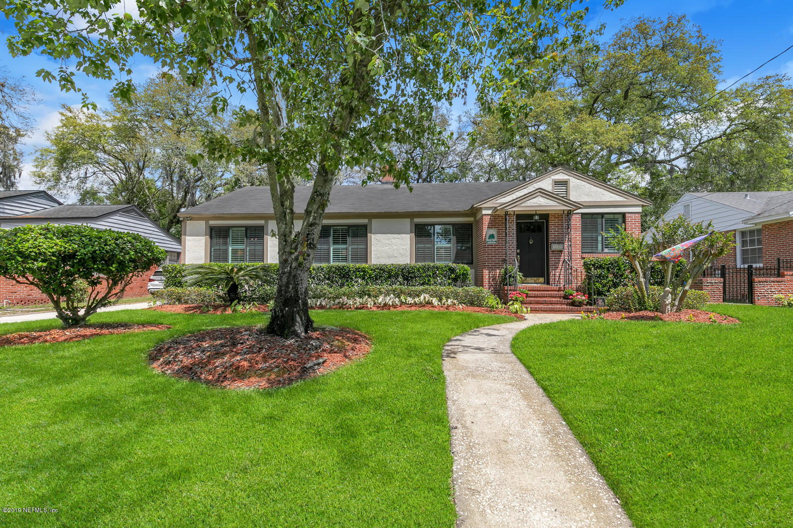 1425 Nicholson Road Jacksonville, FL 32207 - Photo 1 of 45 a front view of house with yard and green space