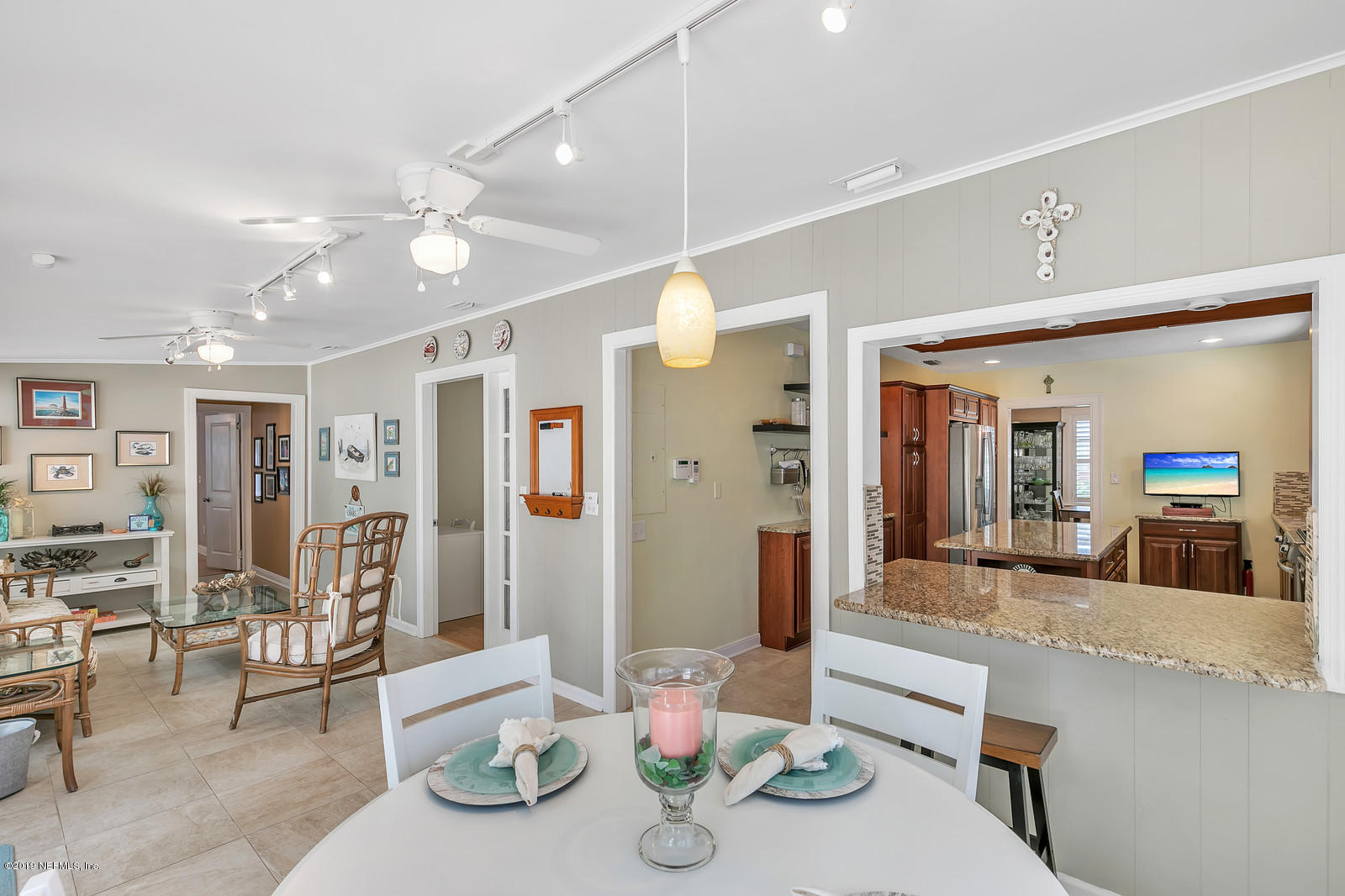 1425 Nicholson Road Jacksonville, FL 32207 - Photo 11 of 45 a view of a dining room with furniture and chandelier