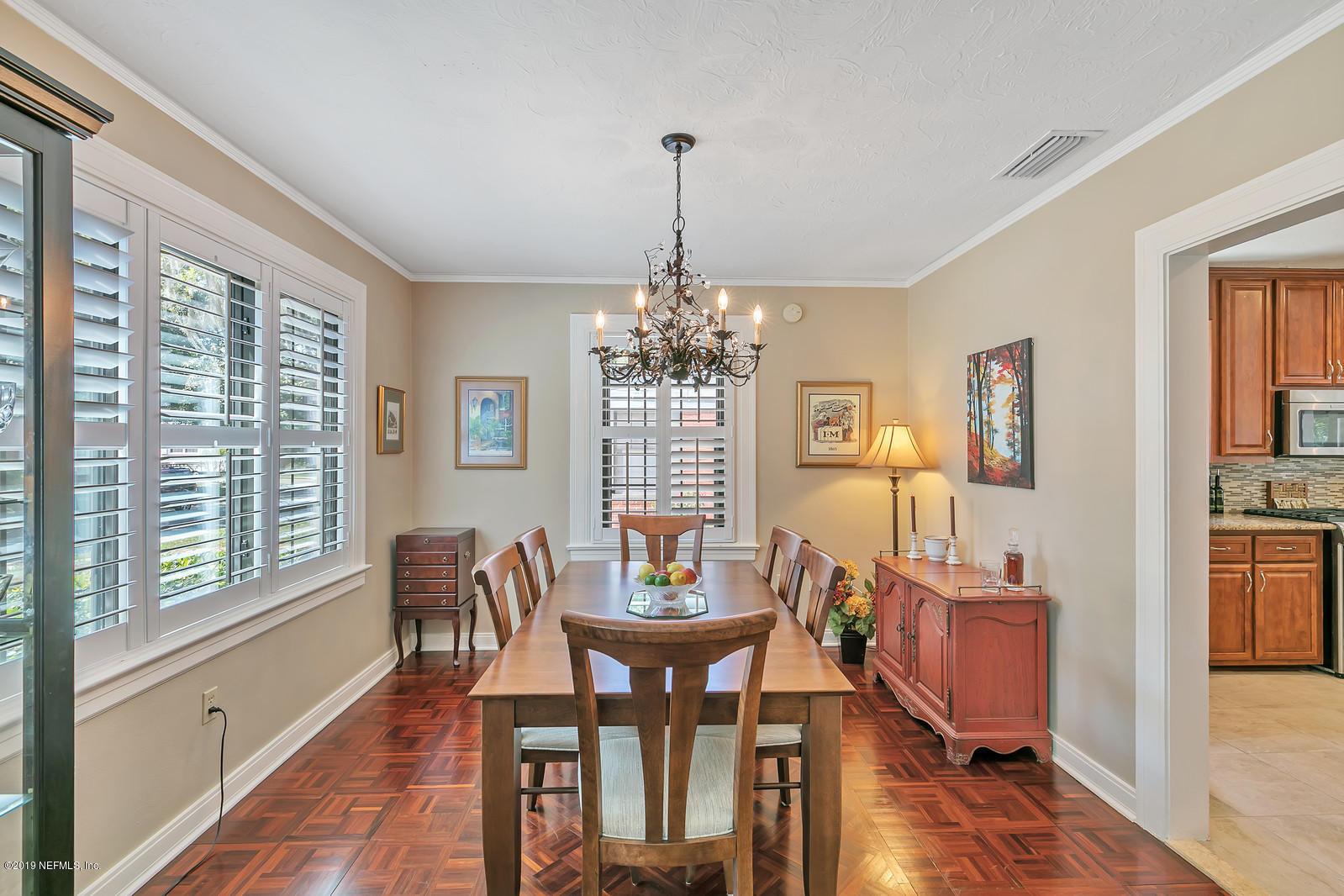 1425 Nicholson Road Jacksonville, FL 32207 - Photo 15 of 45 a view of a dining room with furniture window and wooden floor