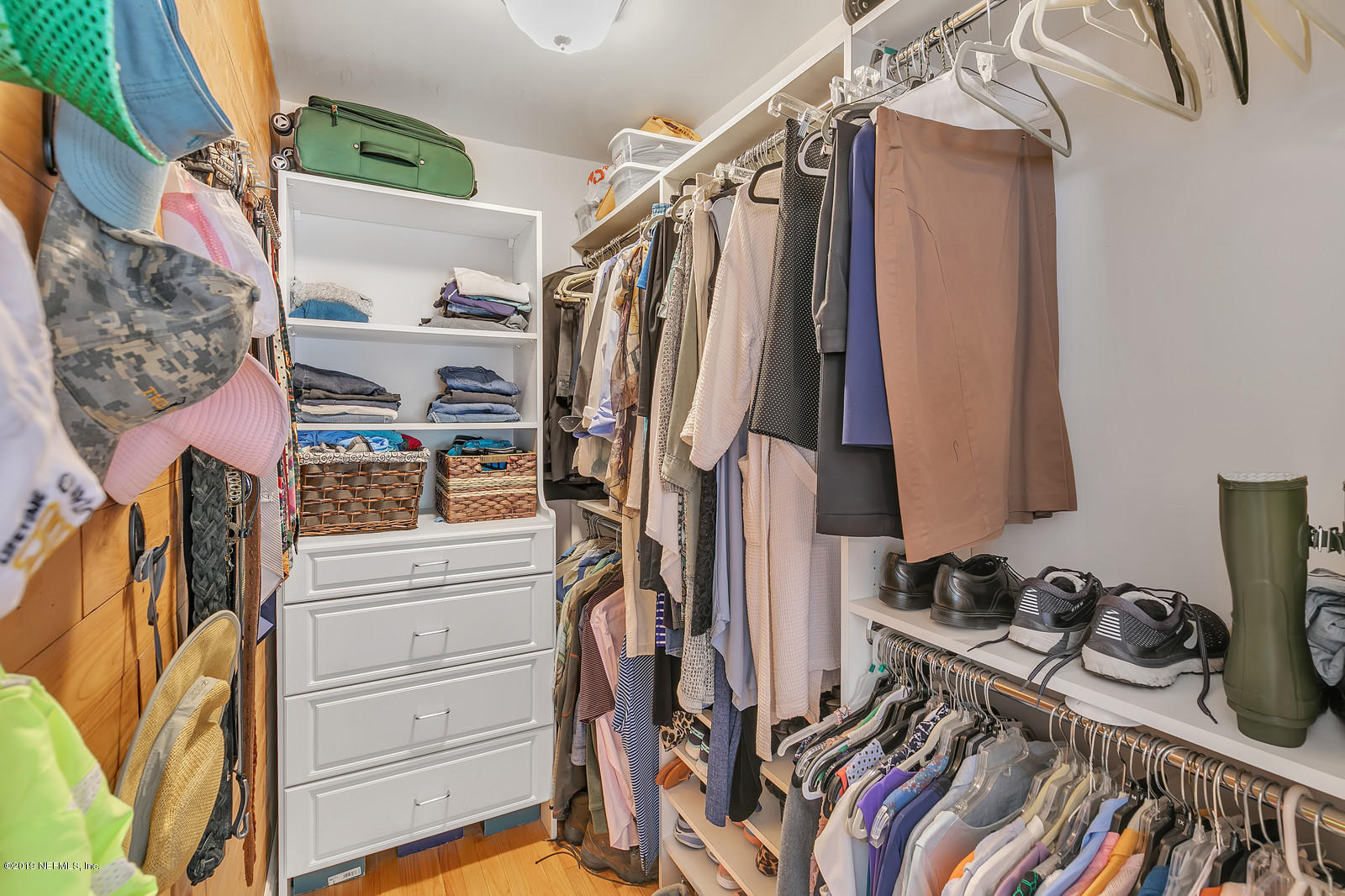 1425 Nicholson Road Jacksonville, FL 32207 - Photo 23 of 45 a view of walk in closet with clothes