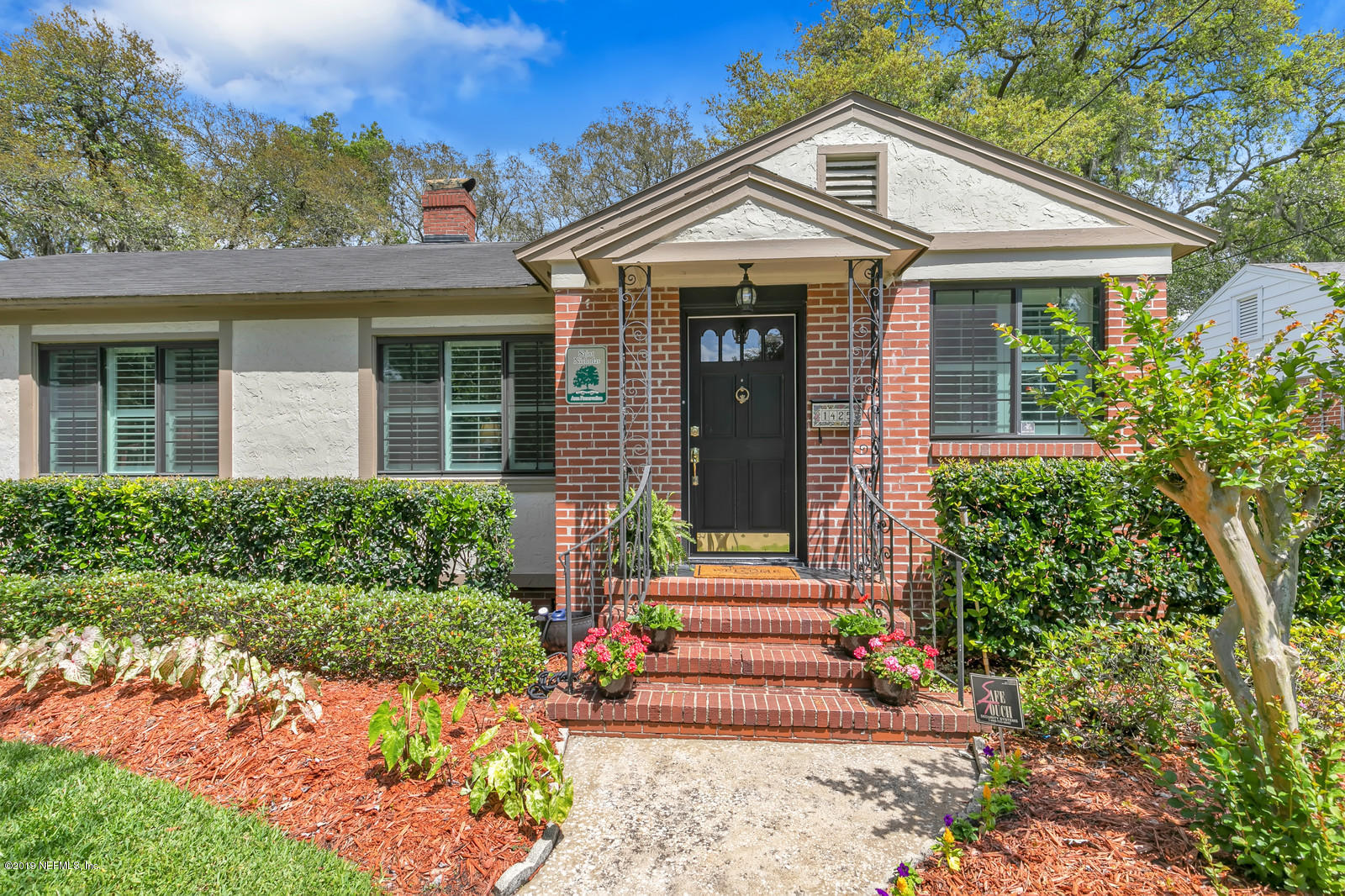 1425 Nicholson Road Jacksonville, FL 32207 - Photo 3 of 45 front view of a house with a yard