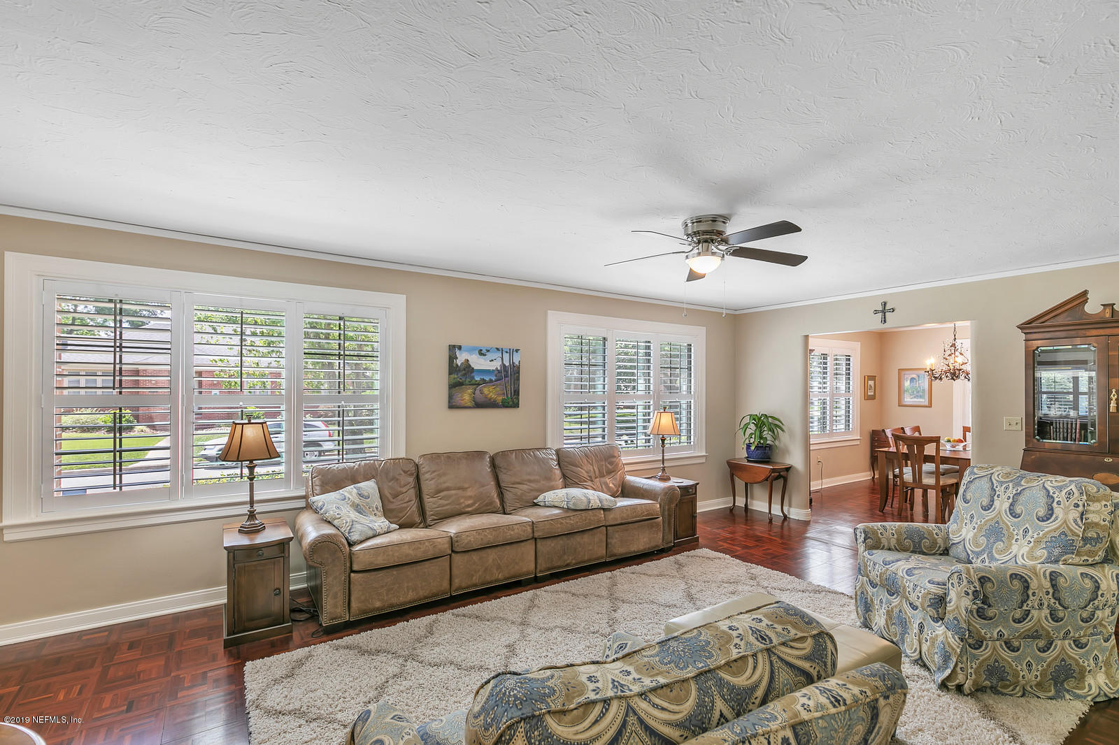1425 Nicholson Road Jacksonville, FL 32207 - Photo 33 of 45 a living room with furniture and large windows