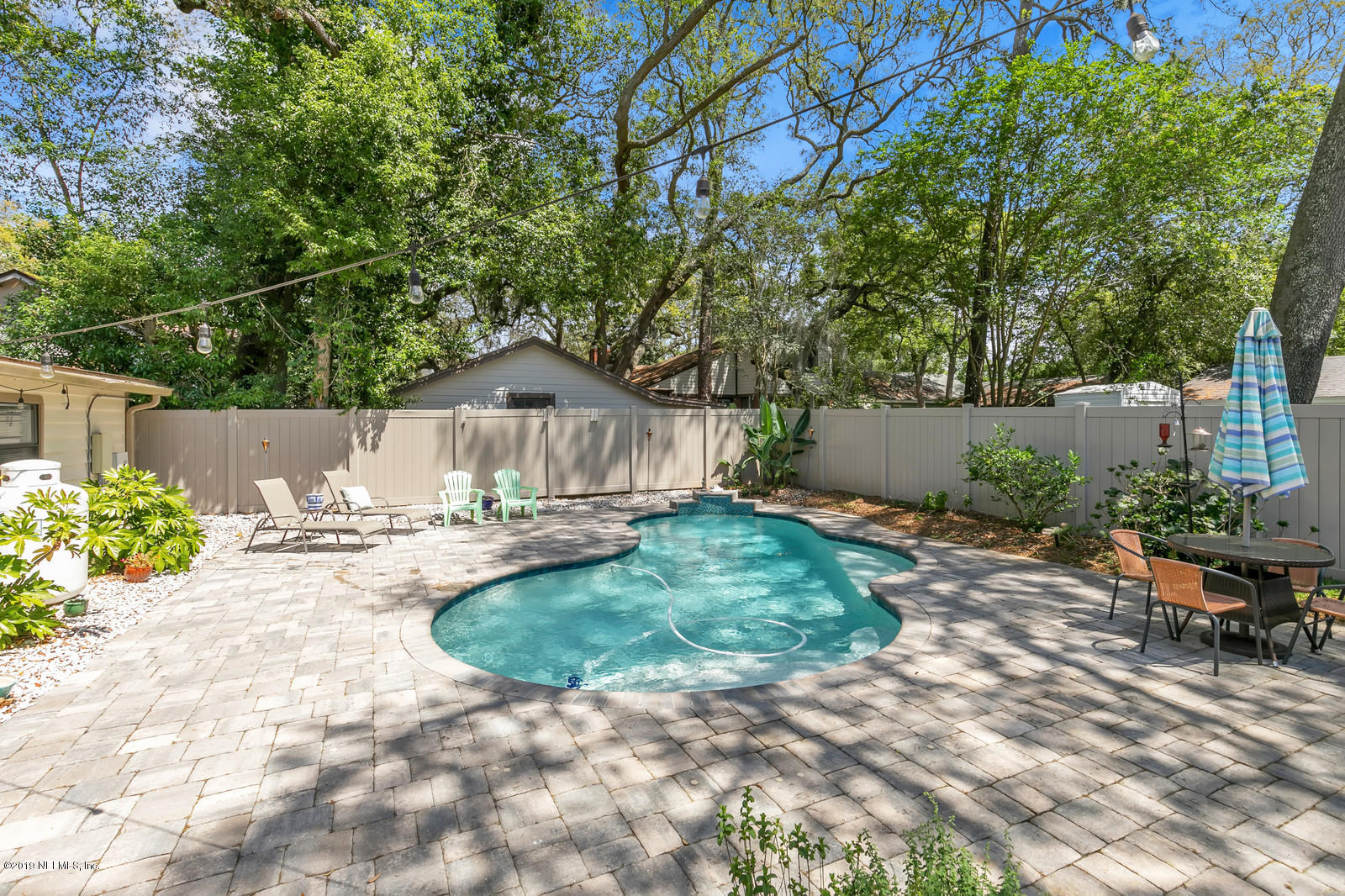 1425 Nicholson Road Jacksonville, FL 32207 - Photo 9 of 45 a view of a backyard with sitting area and furniture