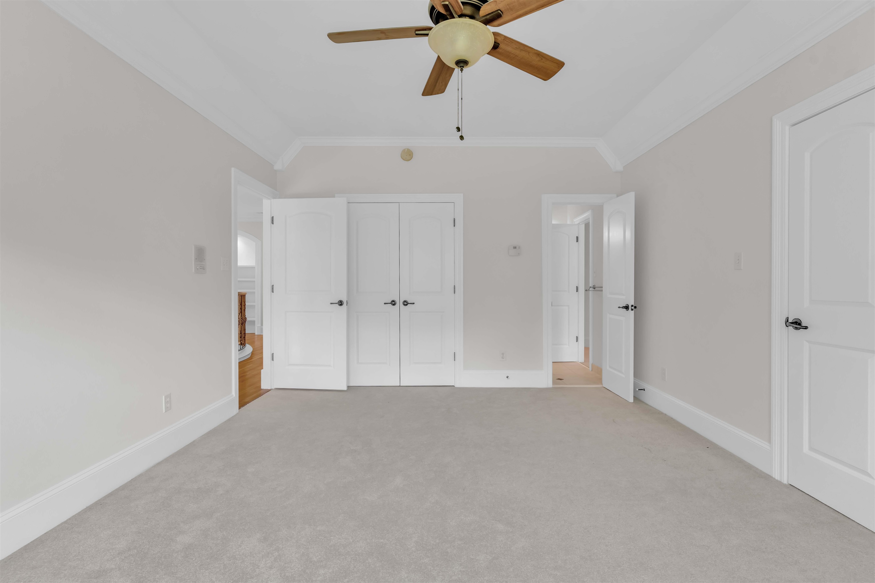 680 Highway 193 Collierville, TN 38017 - Photo 33 of 38 Carpeted room featuring a ceiling fan with light fixture, vaulted ceiling, crown molding, and white trim