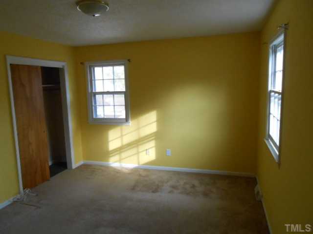 4700 Waterbury Road Raleigh, NC 27604 - Photo 8 of 9 a view of empty room with windows