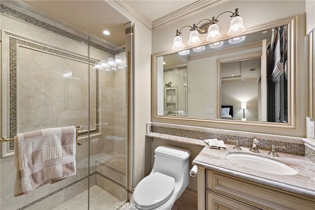 a kitchen with stove and refrigerator