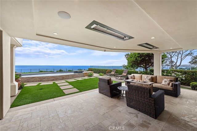 a view of swimming pool with seating space