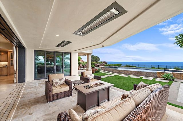 a view of swimming pool with seating space