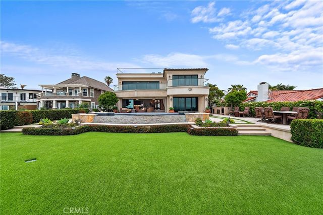 a view of walk in closet with clothes