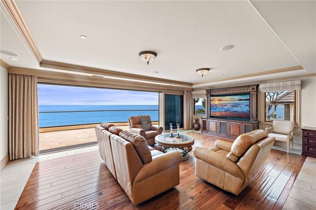 a bathroom with a granite countertop sink toilet a mirror and shower