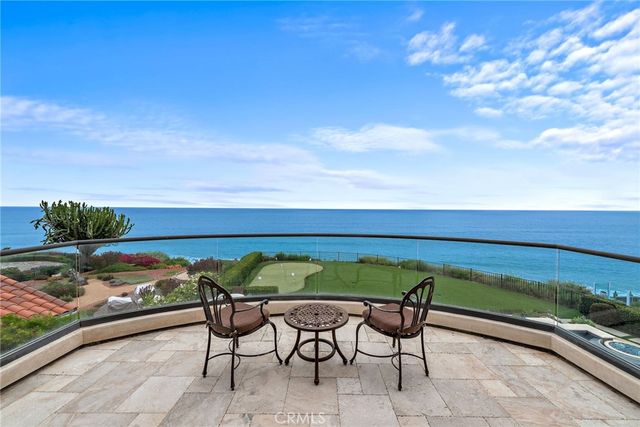 a view of a hallway with couches