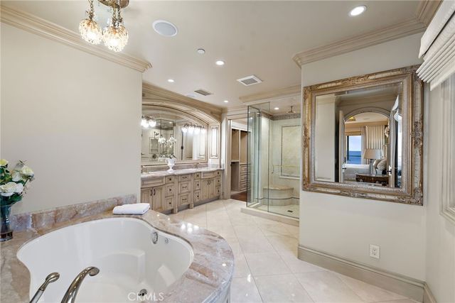 front view of a house with potted plants