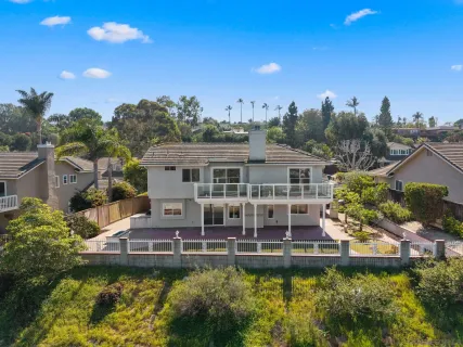 a view of a house with swimming pool