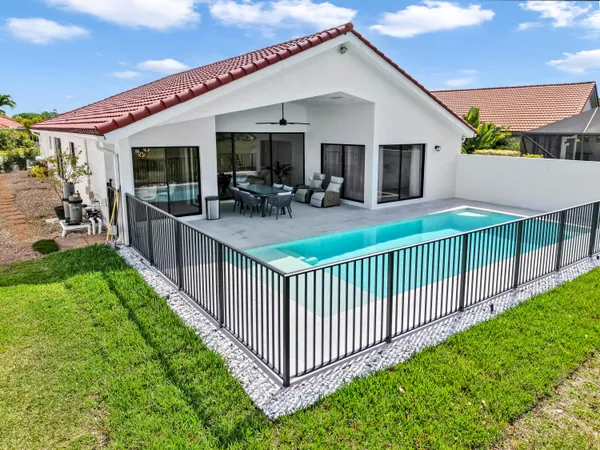 a view of a porch and garden
