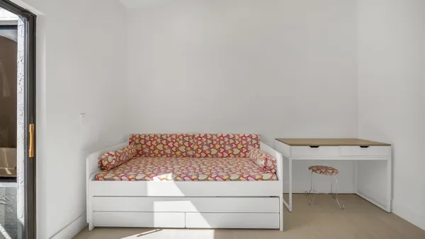 a utility room with washer and dryer
