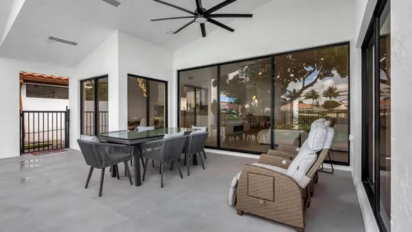 a view of a livingroom with furniture window and outside view