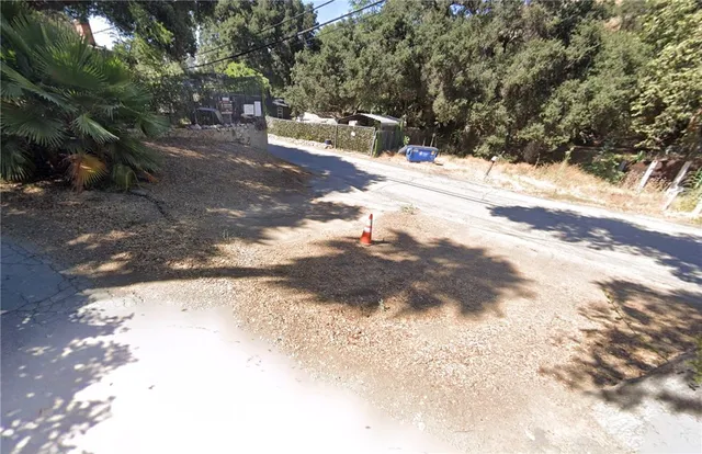 a view of road with view of outdoor space