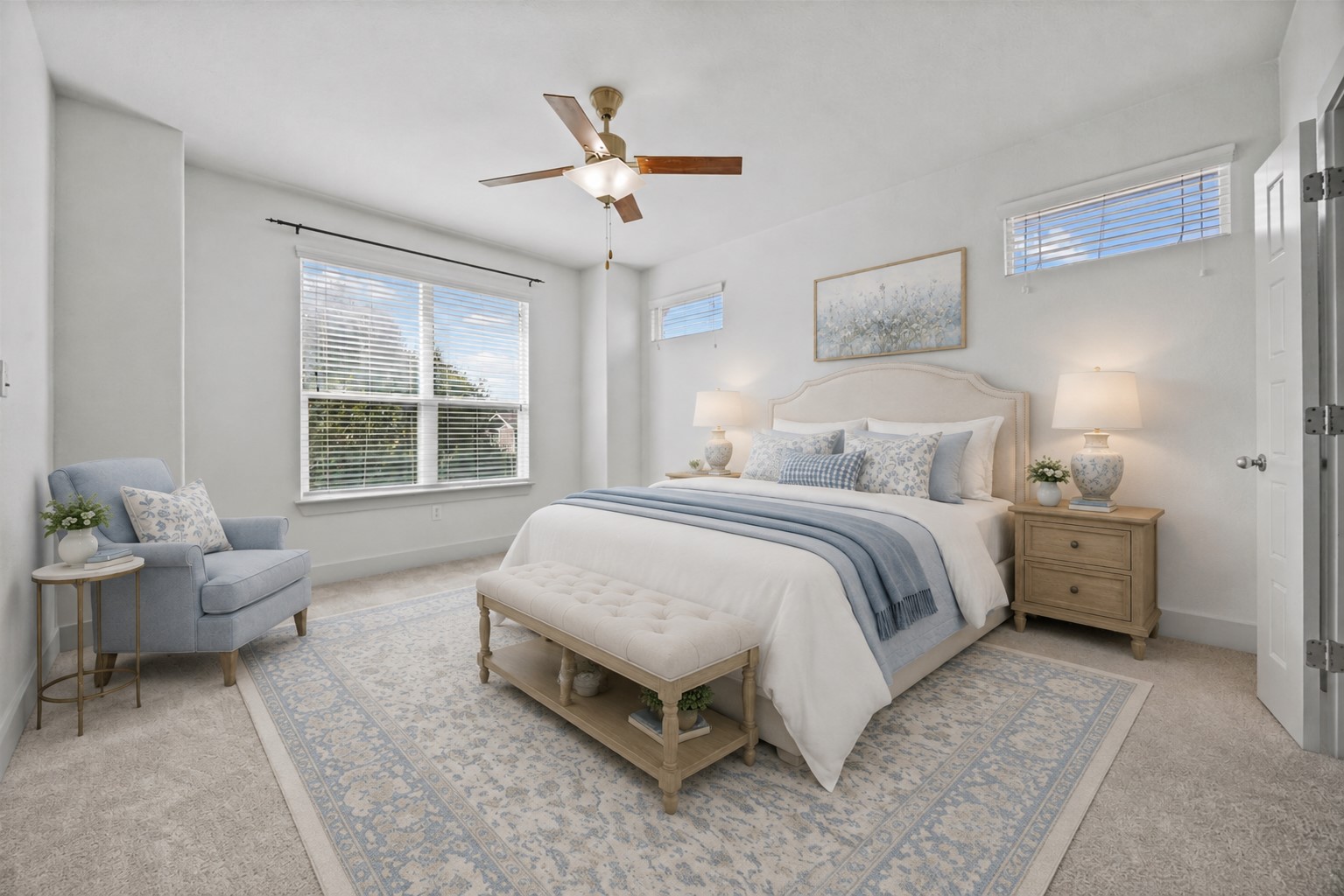 2303 Capulet Street Austin, TX 78741 - Photo 13 of 24 The spacious primary bedroom is filled with natural light from multiple windows with blinds. A ceiling fan provides added comfort and a relaxing atmosphere. This virtually staged picture gives you options of where to place your bed.